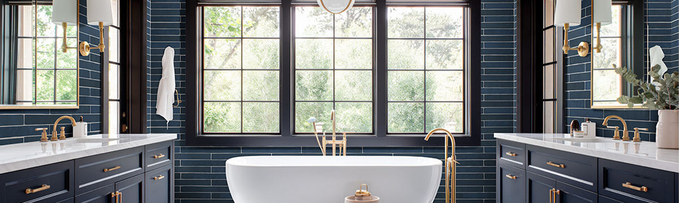 Navy blue tile on bathroom wall