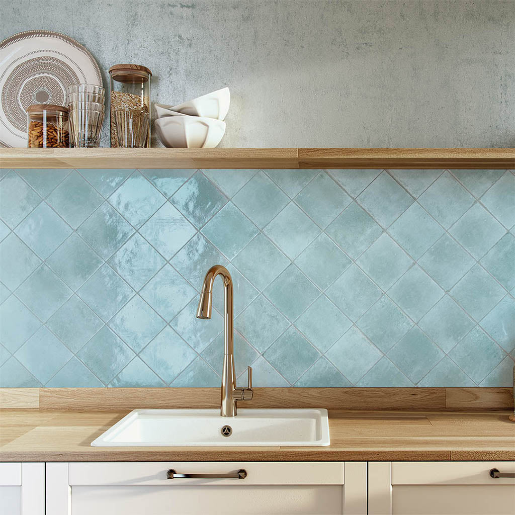 Blue porcelain tile on kitchen backsplash